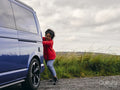 Woman pushing van