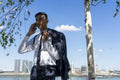 Businessman talking on phone outdoors