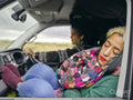Women driving and sleeping in car