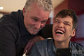 Portrait of smiling father and son