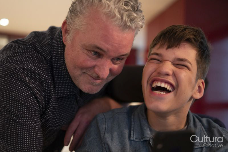 Portrait of smiling father and son
