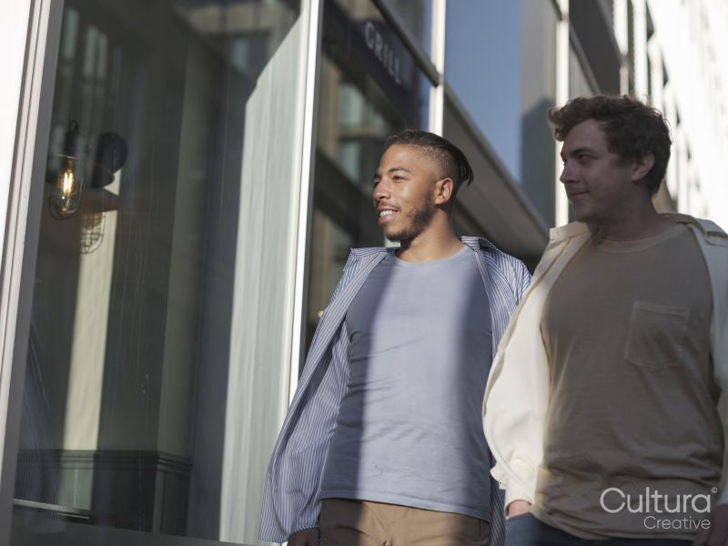 South Yorkshire, Smiling couple walking in city