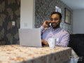 Man working on laptop from home