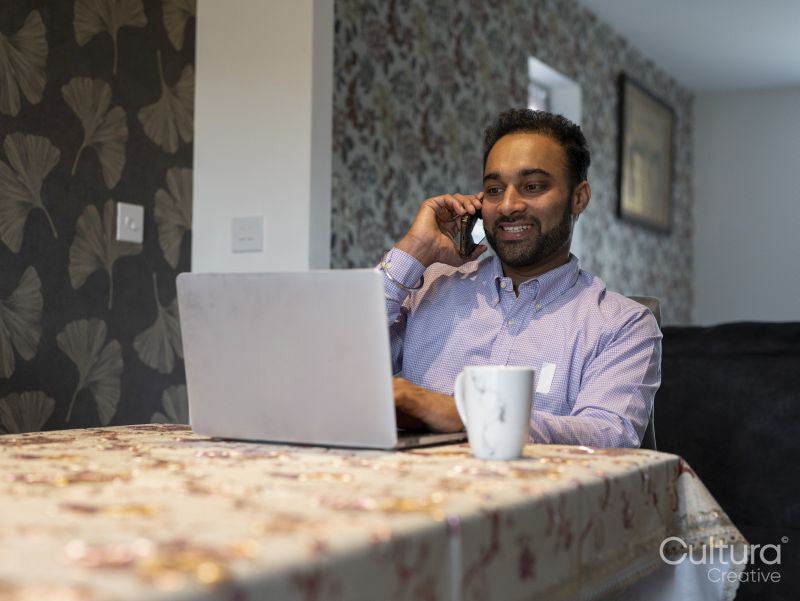 Man working on laptop from home