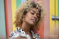 Portrait of woman with curly hair