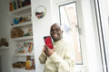Man with Down syndrome using phone