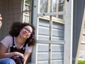 Girl sitting on porch
