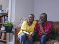 Couple sitting on sofa