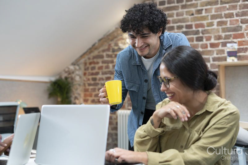 Creative professionals working in office