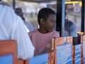 Boy on land train tourist ride