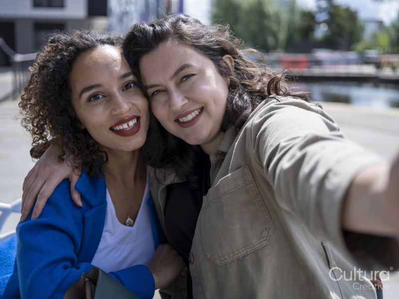 Portrait of smiling couple embracing outdoors