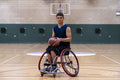 Portrait of male basketball player in wheelchair