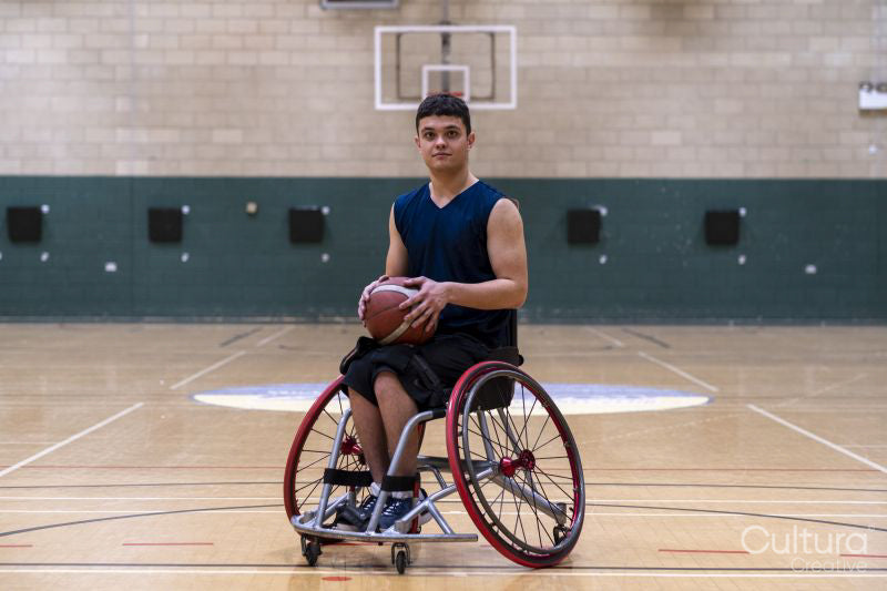 Portrait of male basketball player in wheelchair
