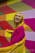 Smiling young woman with yellow hair