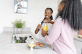 couple preparing breakfast in kitchen