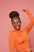 Studio portrait of stylish woman dancing