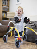 Boy with cerebral palsy walking with mobility walker