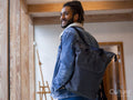 Rear view of young man with backpack