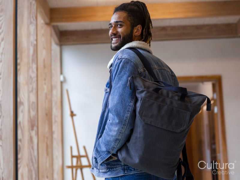 Rear view of young man with backpack