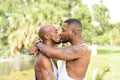 Louisiana, couple kissing in park