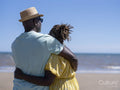 Mature couple hugging on beach