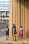 Fashion shot of four people standing in urban street
