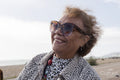 Portrait of senior woman in sunglasses on sunny day