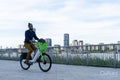Businessman riding rental bicycle