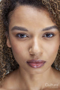 Close-up of woman with curly hair