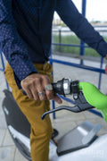 Businessman riding rental bicycle