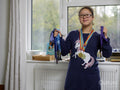 Girl with Down syndrome showing medals