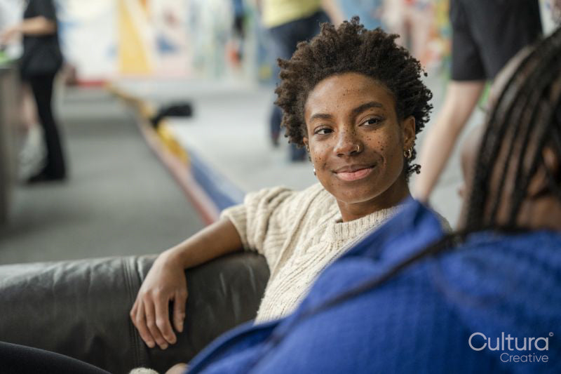 Smiling woman talking with mother