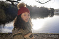 Portrait of young woman at lake