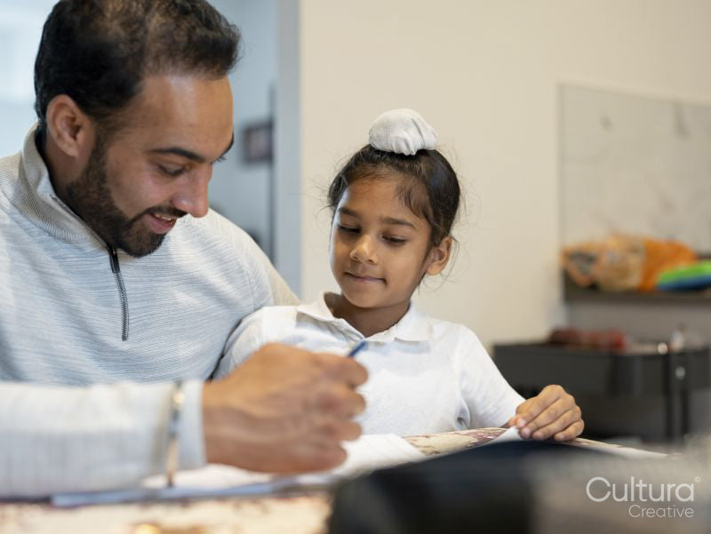 Father helping son with homework