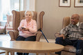 Senior people watching tv in nursing home