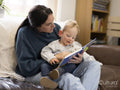 Mother and son reading at home