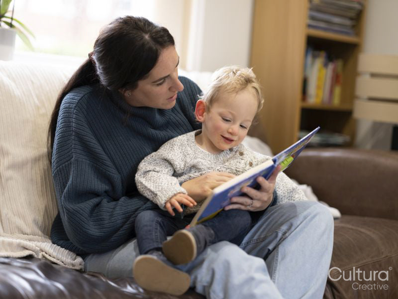 Mother and son reading at home
