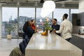 Office workers spending time together in canteen