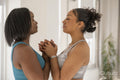 Women meditating in yoga studio