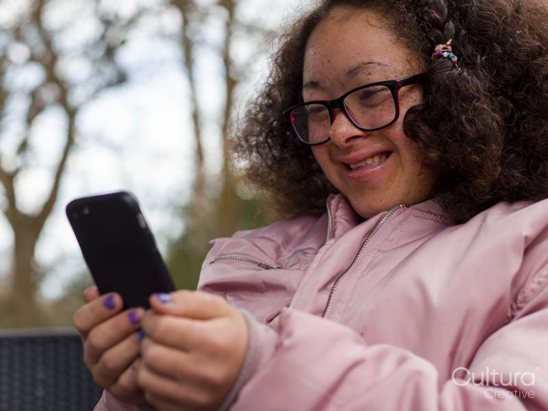 Girl holding mobile phone
