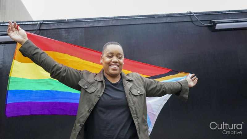 Woman holding pride flag