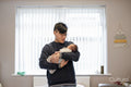 Father holding baby daughter