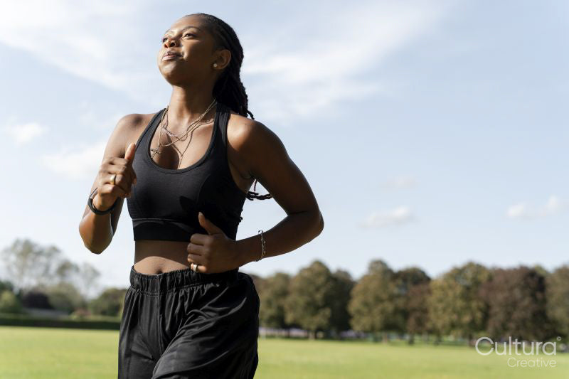 Young woman jogging in park