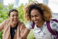 Portrait of two women laughing