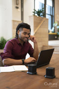 Businessman working on laptop in office
