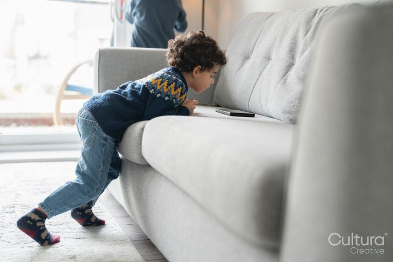 Boy using digital tablet at home