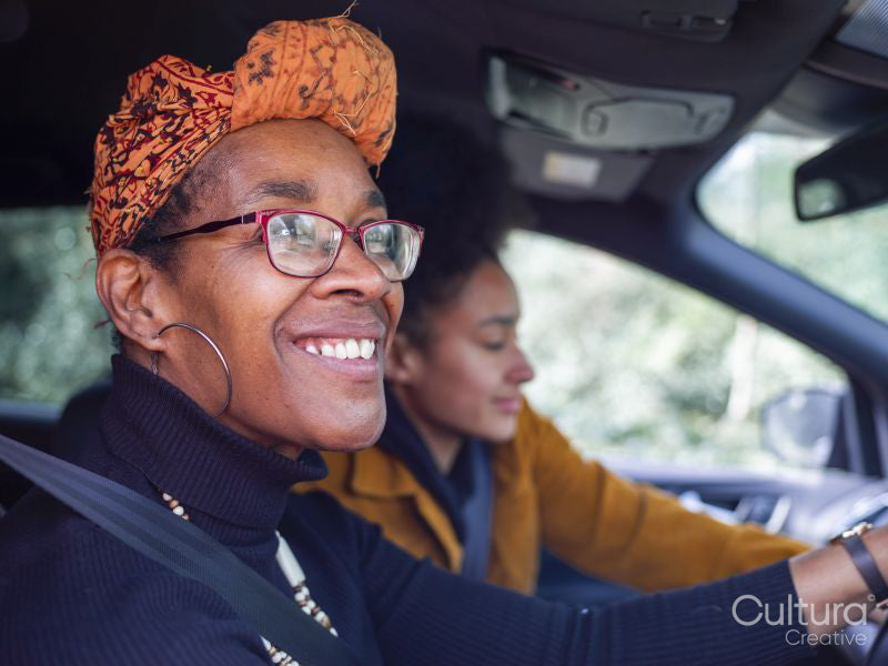 Woman and girl in car