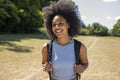 Portrait of young woman hiking in countryside