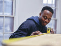 Carpenter working in loft apartment