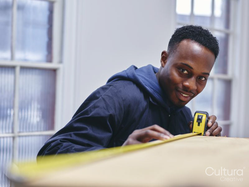 Carpenter working in loft apartment
